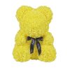 Ours jaune en rose artificielle